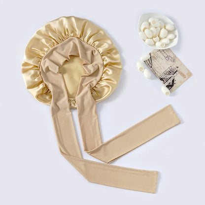 Pure mulberry silk sleeping bonnet designed to protect curly and textured hair overnight