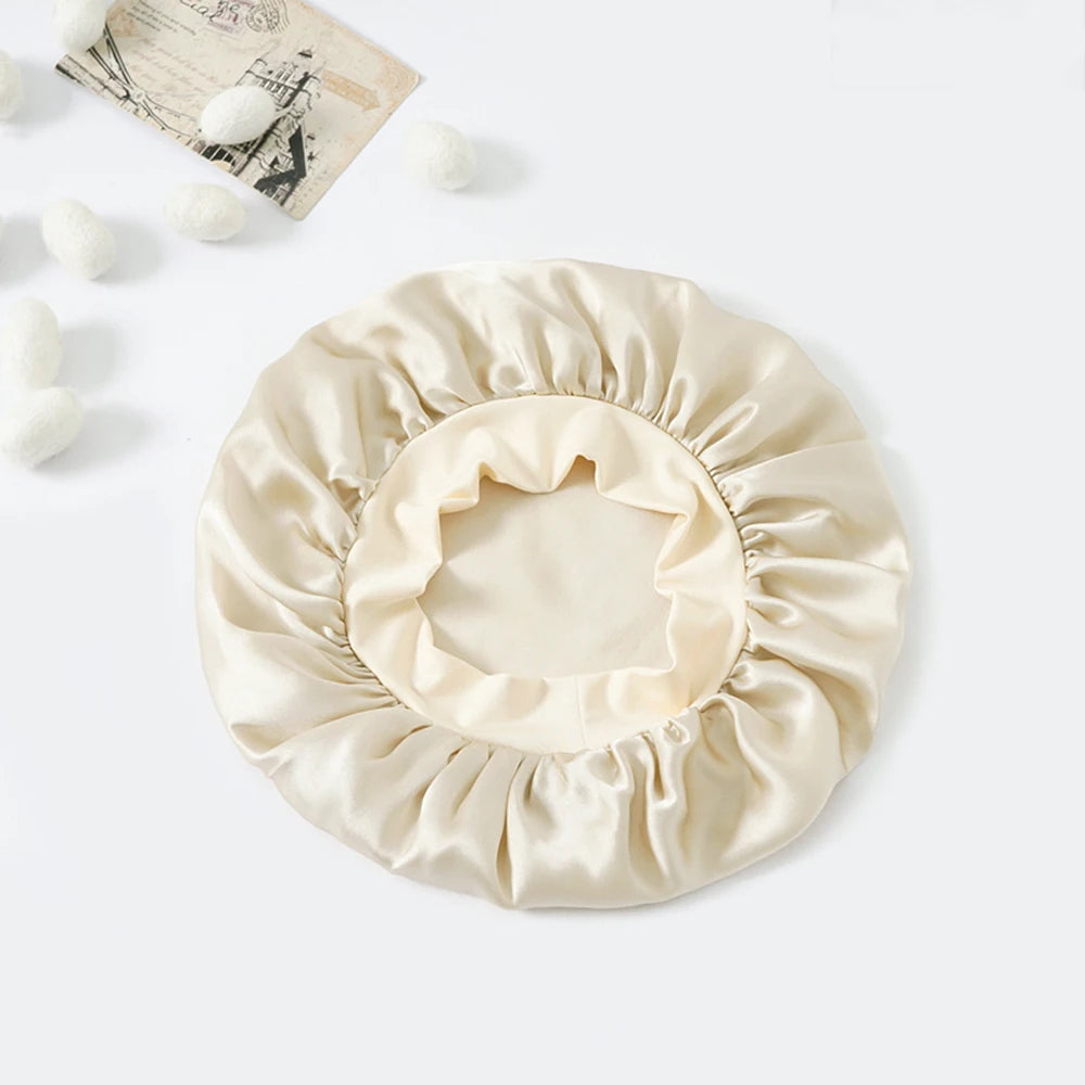 Silk bonnet designed to reduce friction during sleep