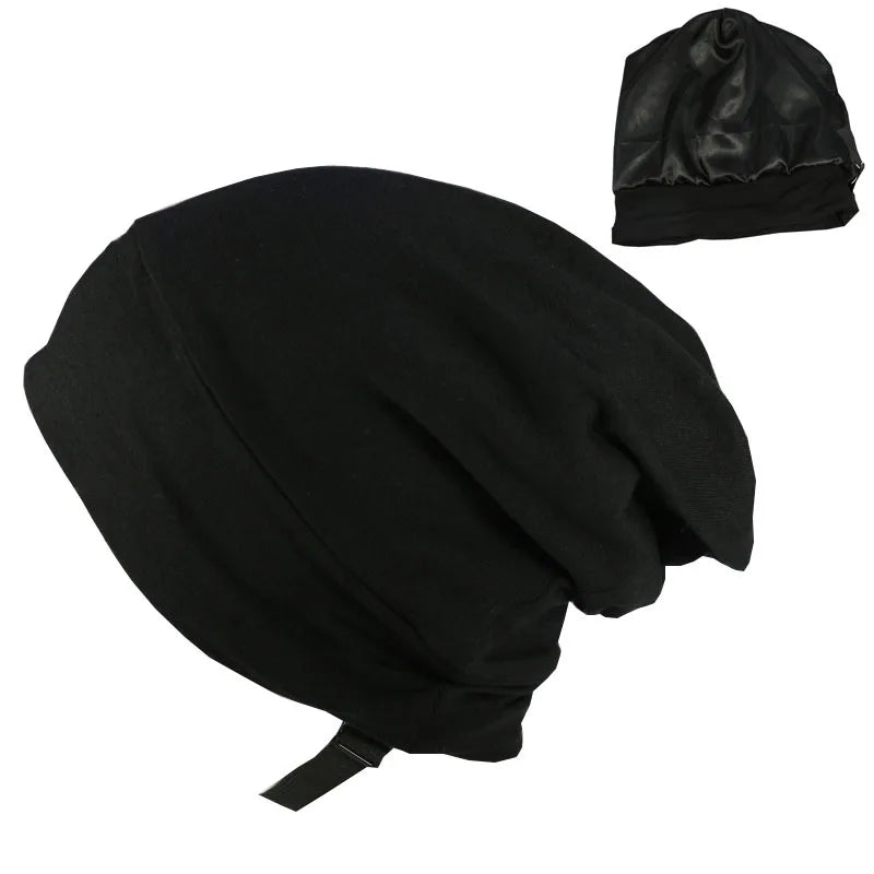Elegant black satin lined beanie – unisex bamboo sleep hat for hair protection and comfort.