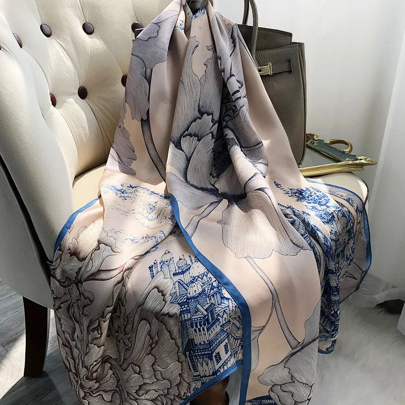 Elegant woman wearing floral silk scarf – Silkvana premium silk