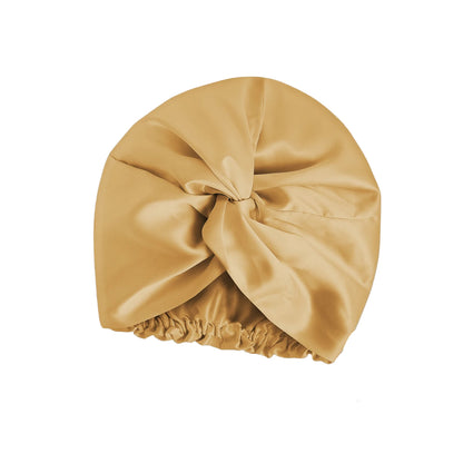 Golden champagne double-layer 100% mulberry silk sleep cap by Silkvana – luxury anti-frizz bonnet for curly and dry hair, breathable and gentle for night use.