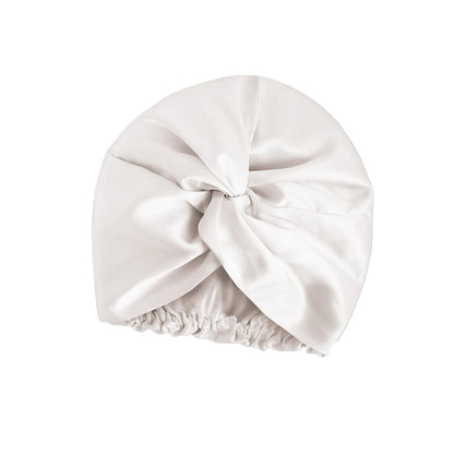 White double-layer 100% mulberry silk sleep cap by Silkvana – smooth anti-frizz bonnet for curly and natural hair, breathable and gentle for night protection.