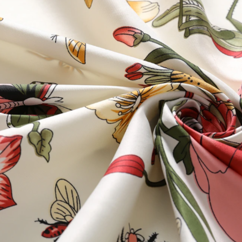 Close-up of luxury twill silk floral fabric – smooth, soft and luminous texture by Silkvana.